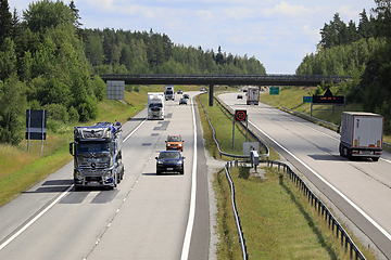 Image showing Truck Traffic on Summer Freeway 