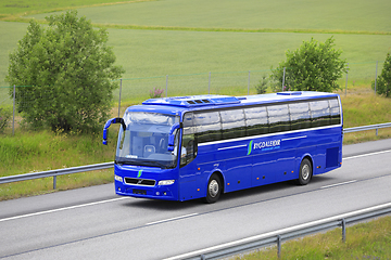 Image showing Blue Volvo Bus Bygdaleidir on Road in Finland
