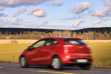 Image showing Red Car at Speed on Highway