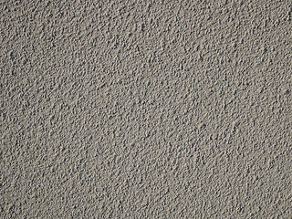 Image showing Detail of bumpy concrete wall painted in gray color