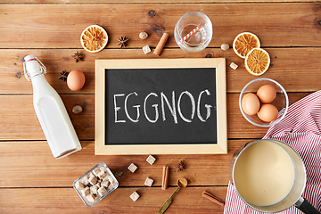 Image showing eggnog word on chalkboard, ingredients and spices