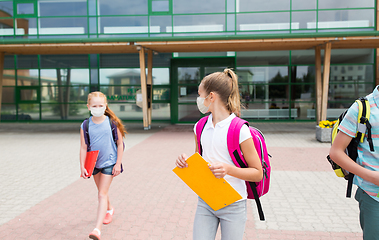 Image showing group of elementary school students in masks