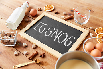 Image showing eggnog word on chalkboard, ingredients and spices