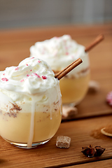 Image showing glasses of eggnog with whipped cream and cinnamon