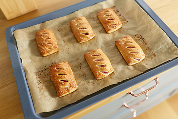 Image showing baking tray with jam pies at home kitchen