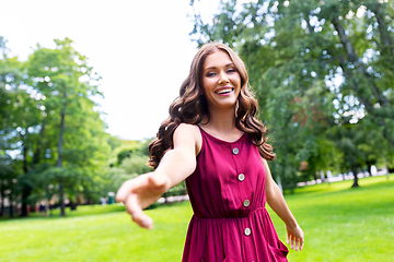 Image showing portrait of happy smiling woman at summer park