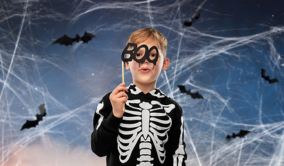 Image showing boy in halloween costume of skeleton making faces