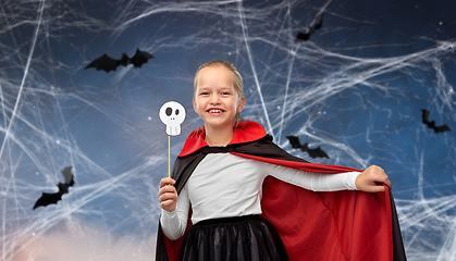 Image showing girl in costume of dracula with cape on halloween