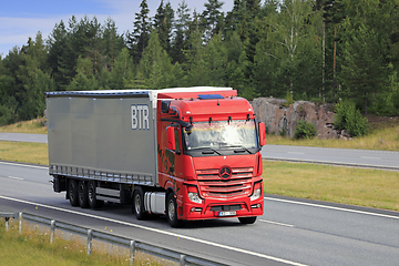 Image showing Red Mercedes-Benz Semi Trailer Truck on Motorway