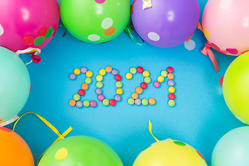 Image showing new year 2021 party date with balloons