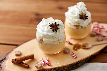 Image showing glasses of eggnog with whipped cream and anise