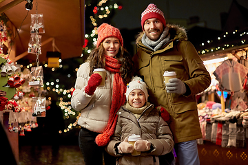 Image showing family with takeaway drinks at christmas market