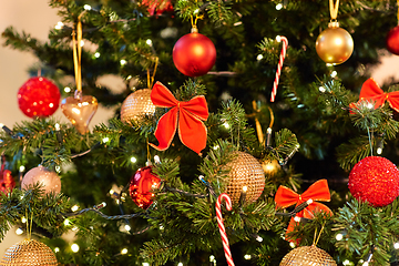 Image showing decorated artificial christmas tree at home