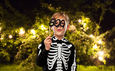 Image showing boy in halloween costume of skeleton making faces