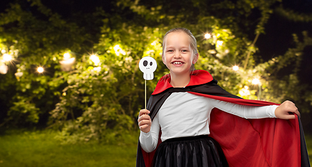 Image showing girl in costume of dracula with cape on halloween