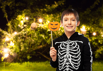 Image showing boy in halloween costume of skeleton with pumpkin