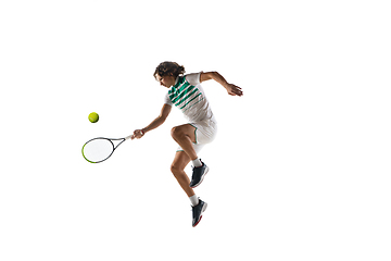 Image showing Young caucasian professional sportsman playing tennis isolated on white background