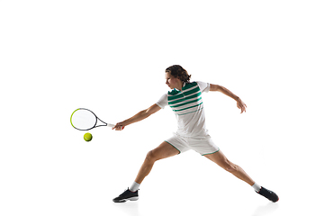 Image showing Young caucasian professional sportsman playing tennis isolated on white background