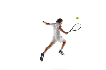 Image showing Young caucasian professional sportsman playing tennis isolated on white background