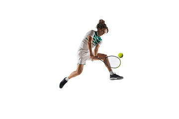 Image showing Young caucasian professional sportsman playing tennis isolated on white background