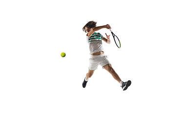 Image showing Young caucasian professional sportsman playing tennis isolated on white background