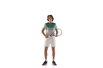 Image showing Young caucasian professional sportsman playing tennis isolated on white background