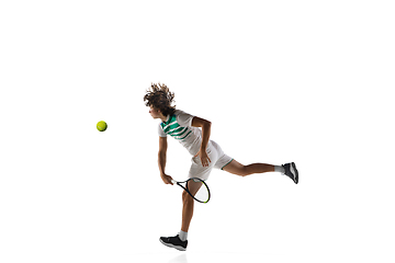 Image showing Young caucasian professional sportsman playing tennis isolated on white background