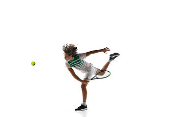 Image showing Young caucasian professional sportsman playing tennis isolated on white background