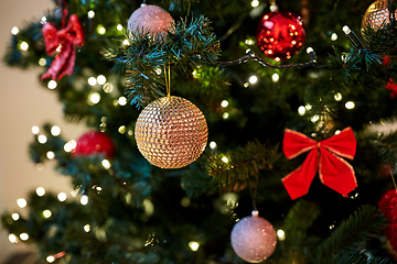 Image showing golden christmas ball decoration on fir tree