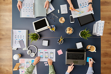 Image showing business team with gadgets working at office table