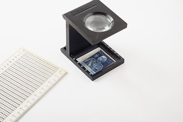 Image showing Stamp and lens