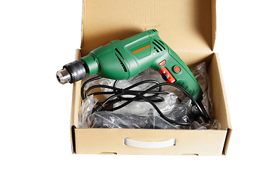 Image showing Electric drill in a box.