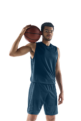 Image showing Young arabian basketball player of team posing isolated on white background. Concept of sport, movement, energy and dynamic.