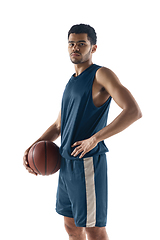 Image showing Young arabian basketball player of team posing isolated on white background. Concept of sport, movement, energy and dynamic.