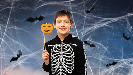 Image showing boy in halloween costume of skeleton with pumpkin