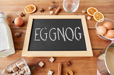 Image showing eggnog word on chalkboard, ingredients and spices