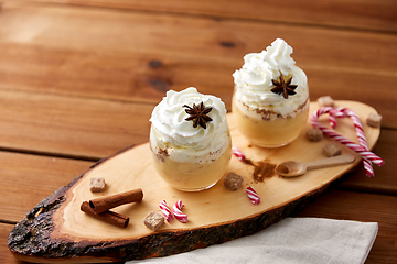 Image showing glasses of eggnog with whipped cream and anise