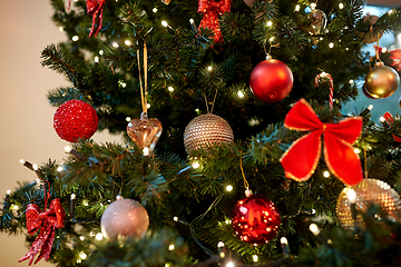 Image showing decorated artificial christmas tree at home