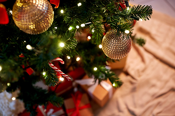 Image showing decorated artificial christmas tree at home