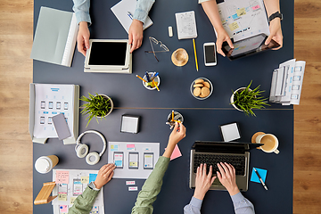 Image showing business team with gadgets working at office table