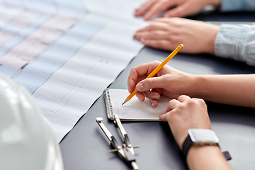 Image showing architect with notebook working at office