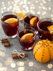 Image showing glasses of mulled wine with orange and cinnamon