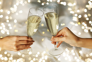 Image showing close up of lesbian couple with champagne glasses