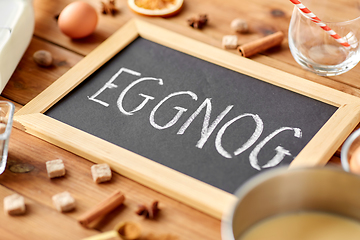 Image showing eggnog word on chalkboard, ingredients and spices