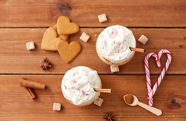 Image showing glasses of eggnog with whipped cream and cinnamon