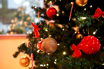 Image showing decorated artificial christmas tree at home