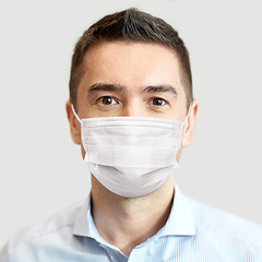 Image showing businessman wearing face protective mask at office