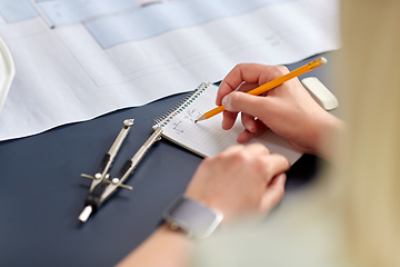 Image showing architect with notebook working at office