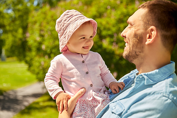 Image showing happy father with baby daughter at summer park