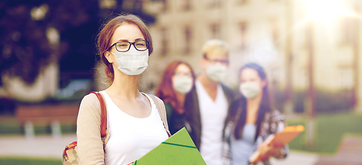 Image showing teenage student girl in mask with school friends